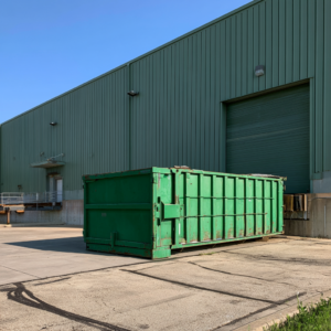 20-yard dumpster outside of a manufacturing facility in Rockford, Illinois